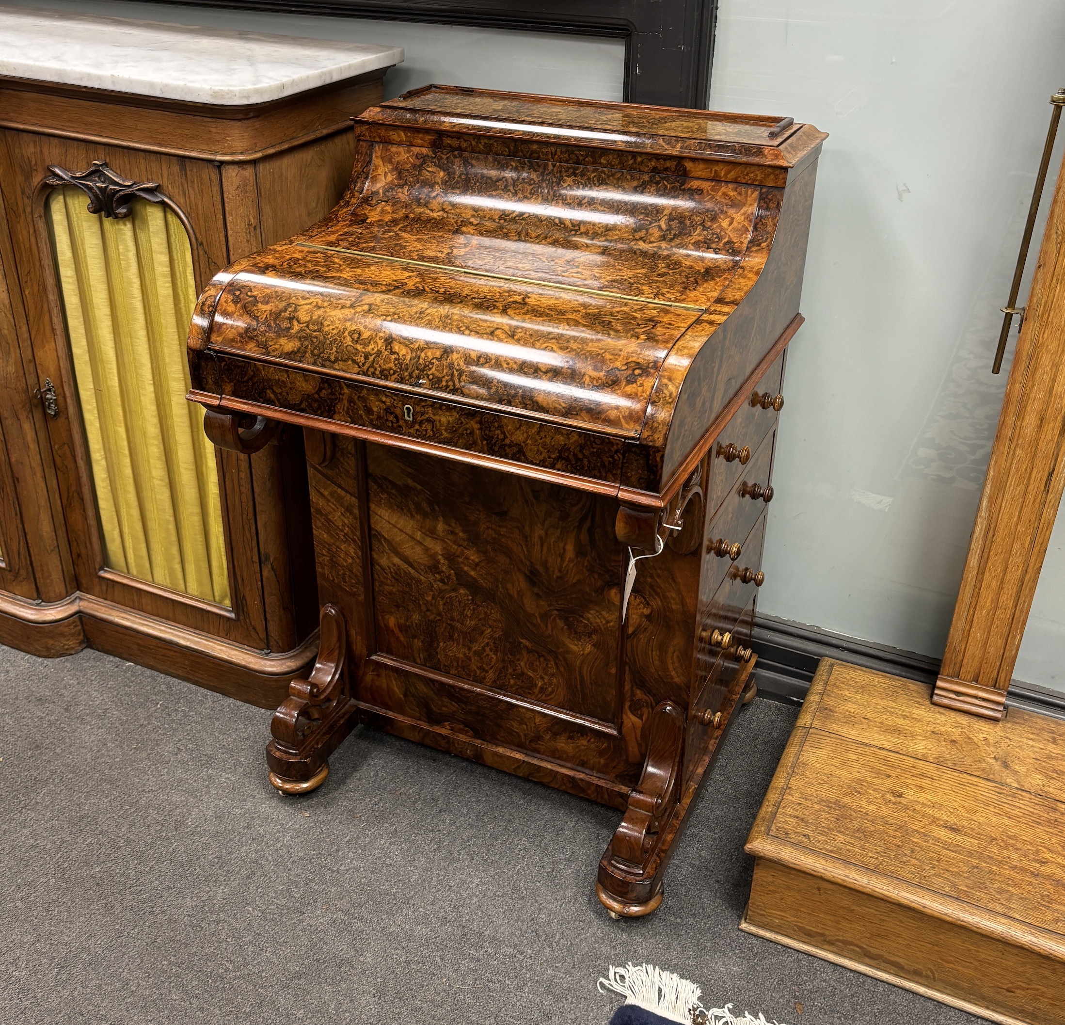 A Victorian burr walnut piano top pop-up Davenport, width 57cm, depth 56cm, height 89cm